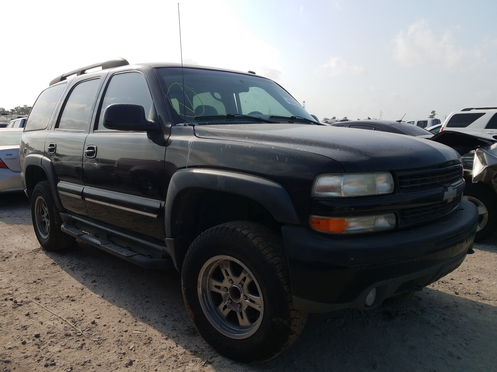 CHEVROLET TAHOE 2002. Lot# 82129834. VIN 1GNEK13ZX2R308010. Photo 1