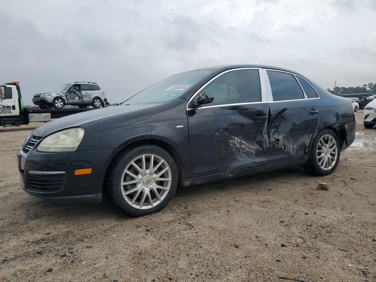 VOLKSWAGEN JETTA 2009. Lot# 86556934. VIN 3VWRJ71K19M005289. Photo 1